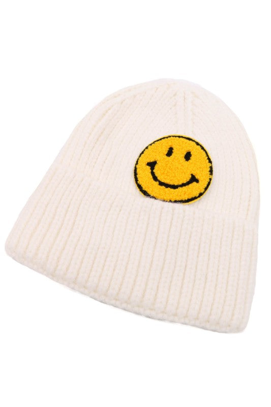 Knit smiley face beanie in Ivory