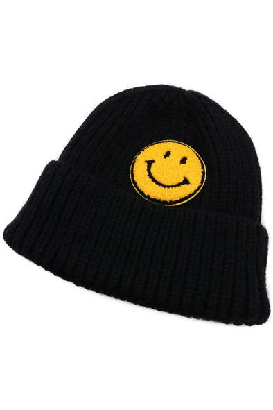 Knit smiley face beanie in Black