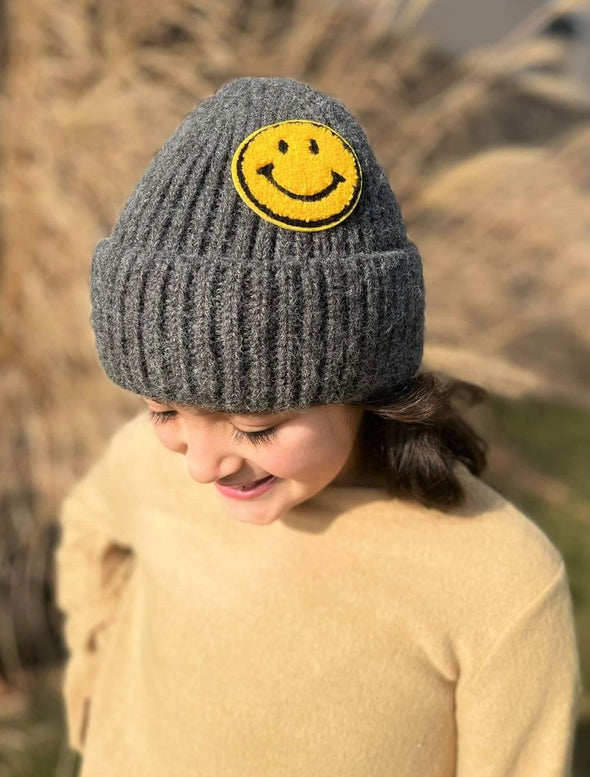 Knit smiley face beanie in Charcoal